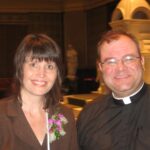 Laura Brumfield and Father Stephen Martin