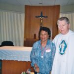 Josette Dumas with Rev. Patrick Daugherty, C.P. at her consecration 9/10/11